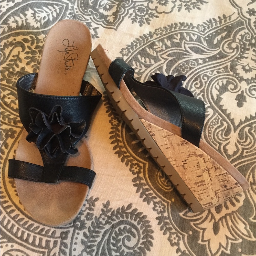 Wedge sandals.